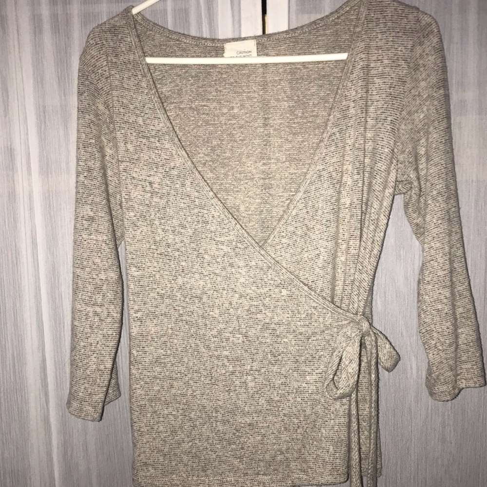 Wrap sweater size medium.